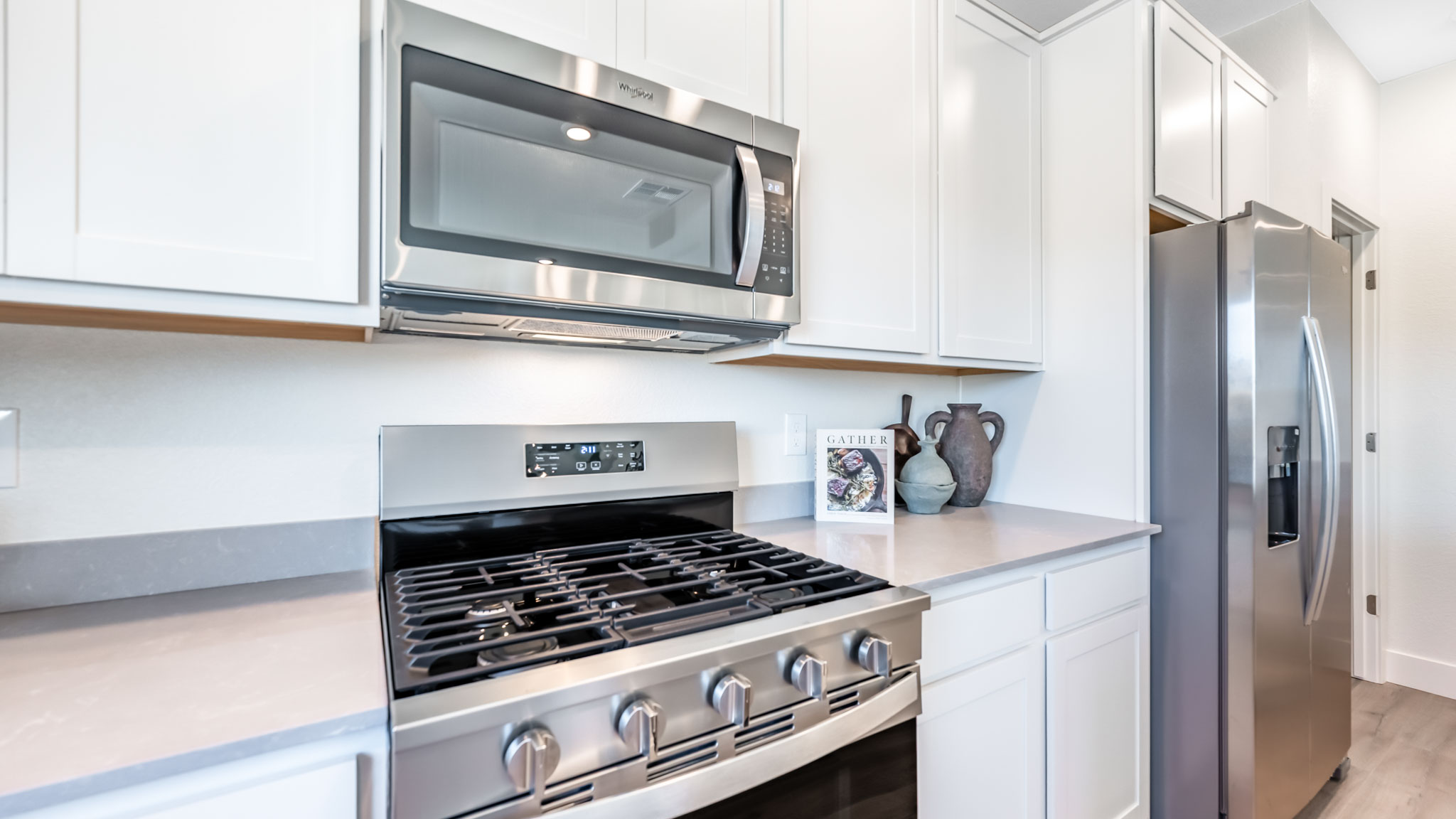Stainless-steel appliances in modern kitchen