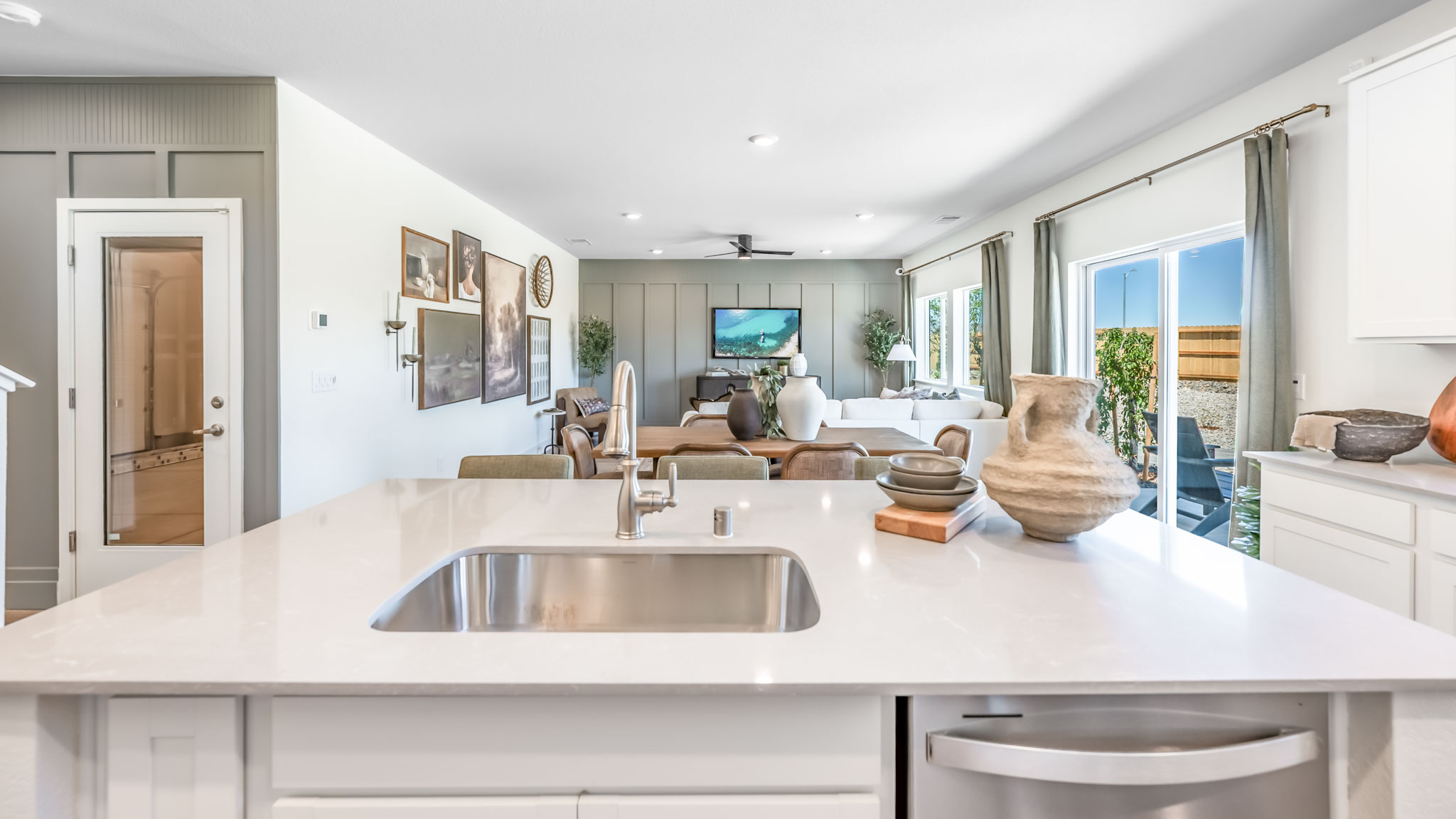 Kitchen island with built in sink and dishwasher