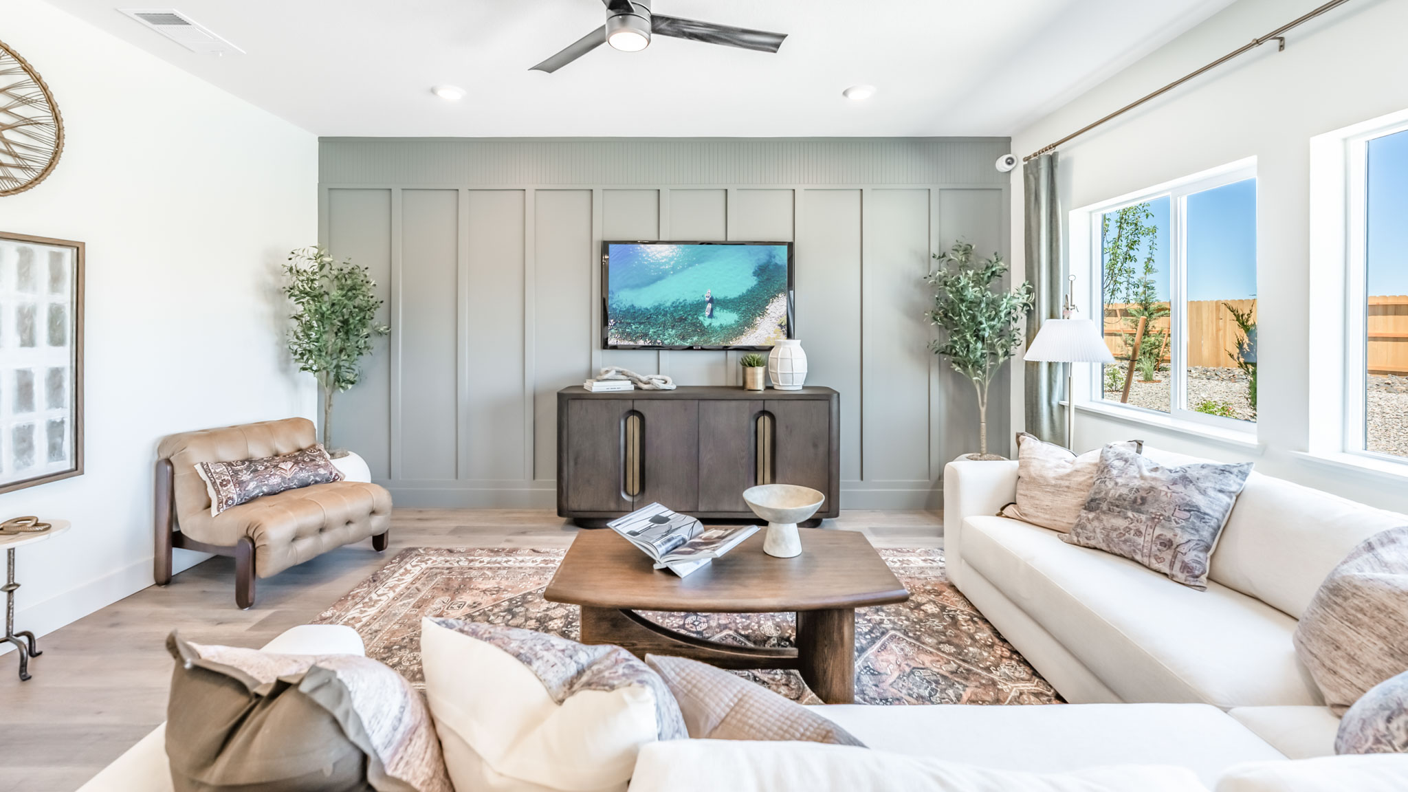 Open-concept first floor living room with bright natural light