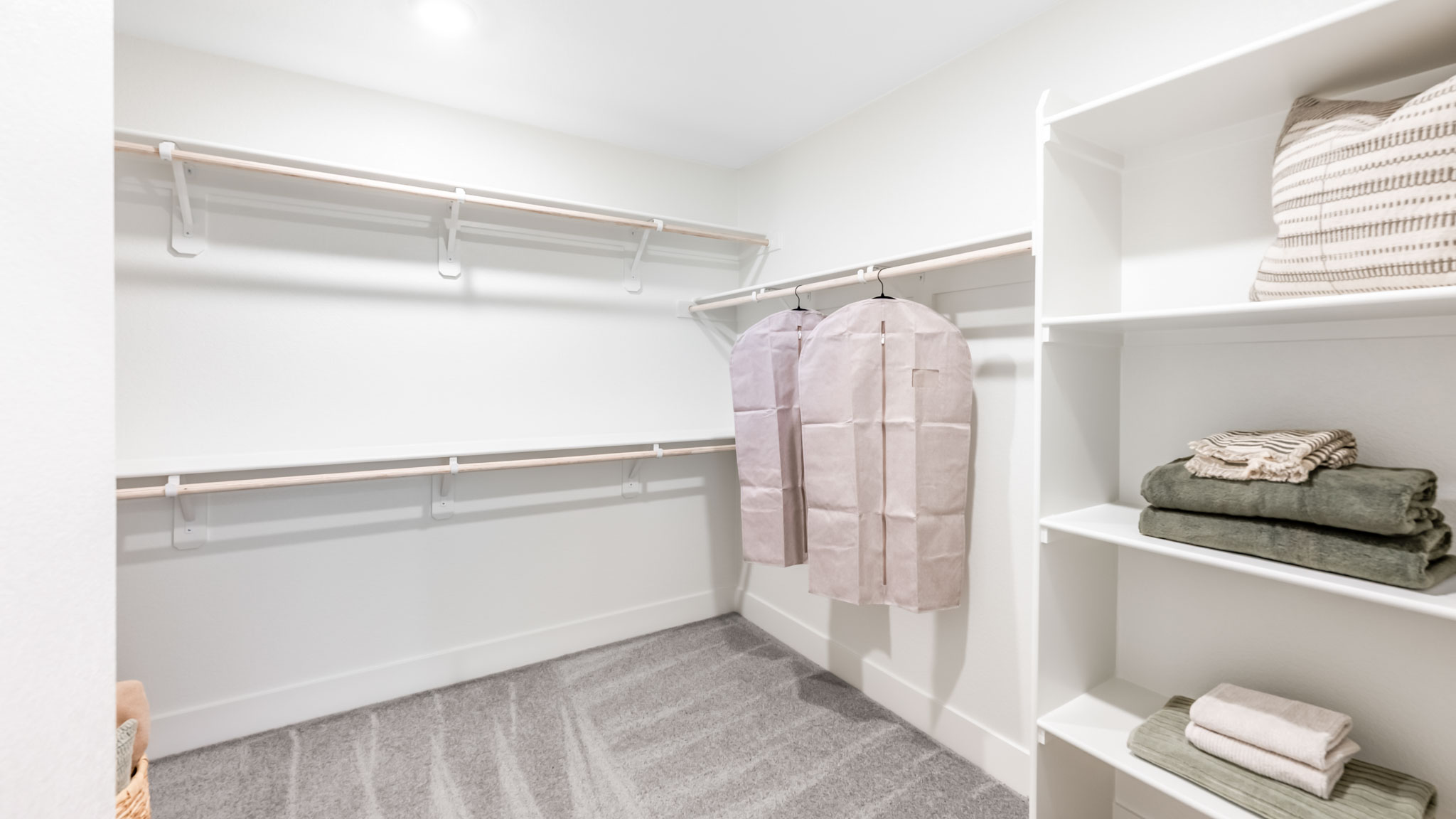 Large walk-in closet with built-in shelves