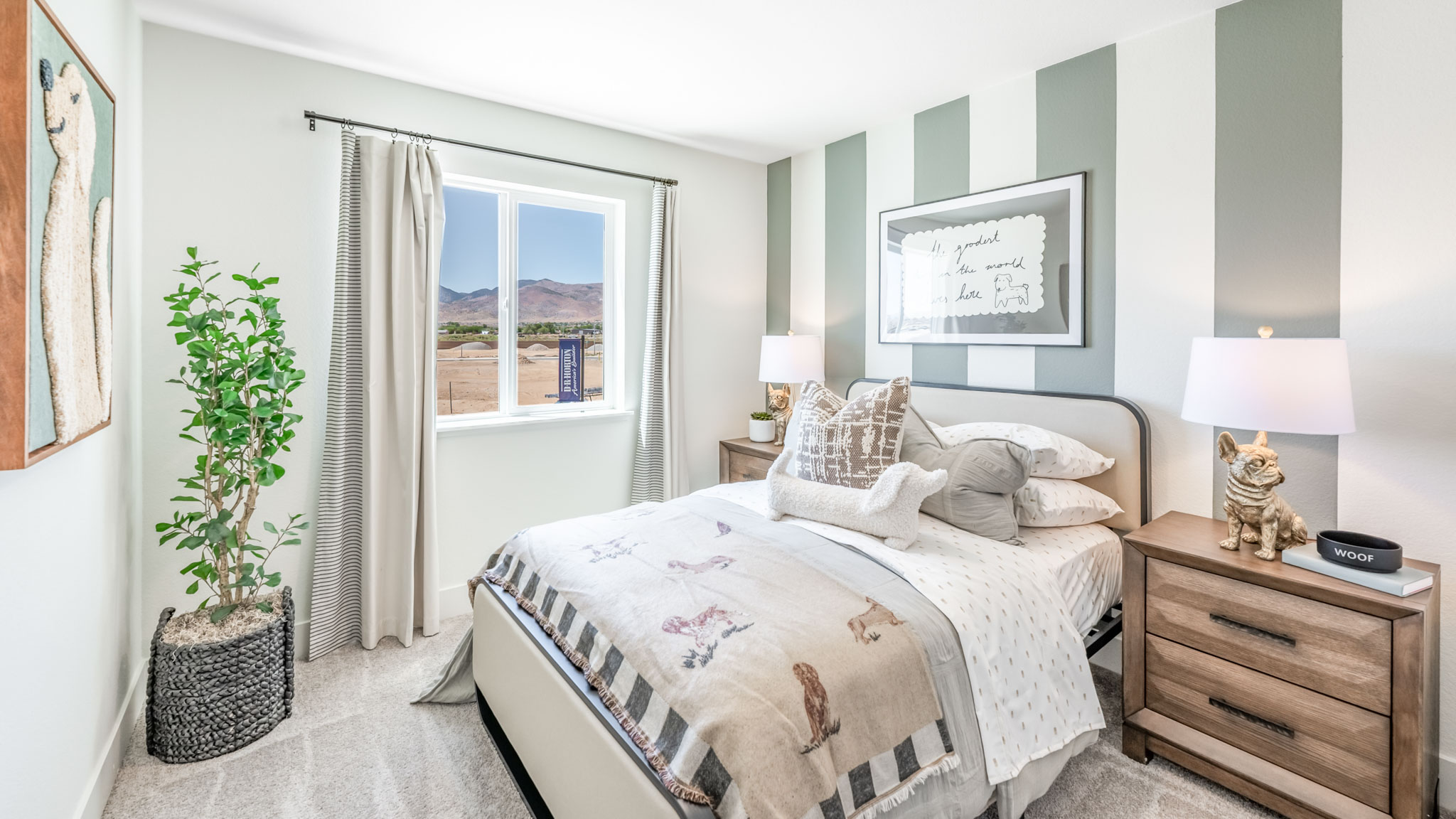 Kid's bedroom with carpeted floor and large window
