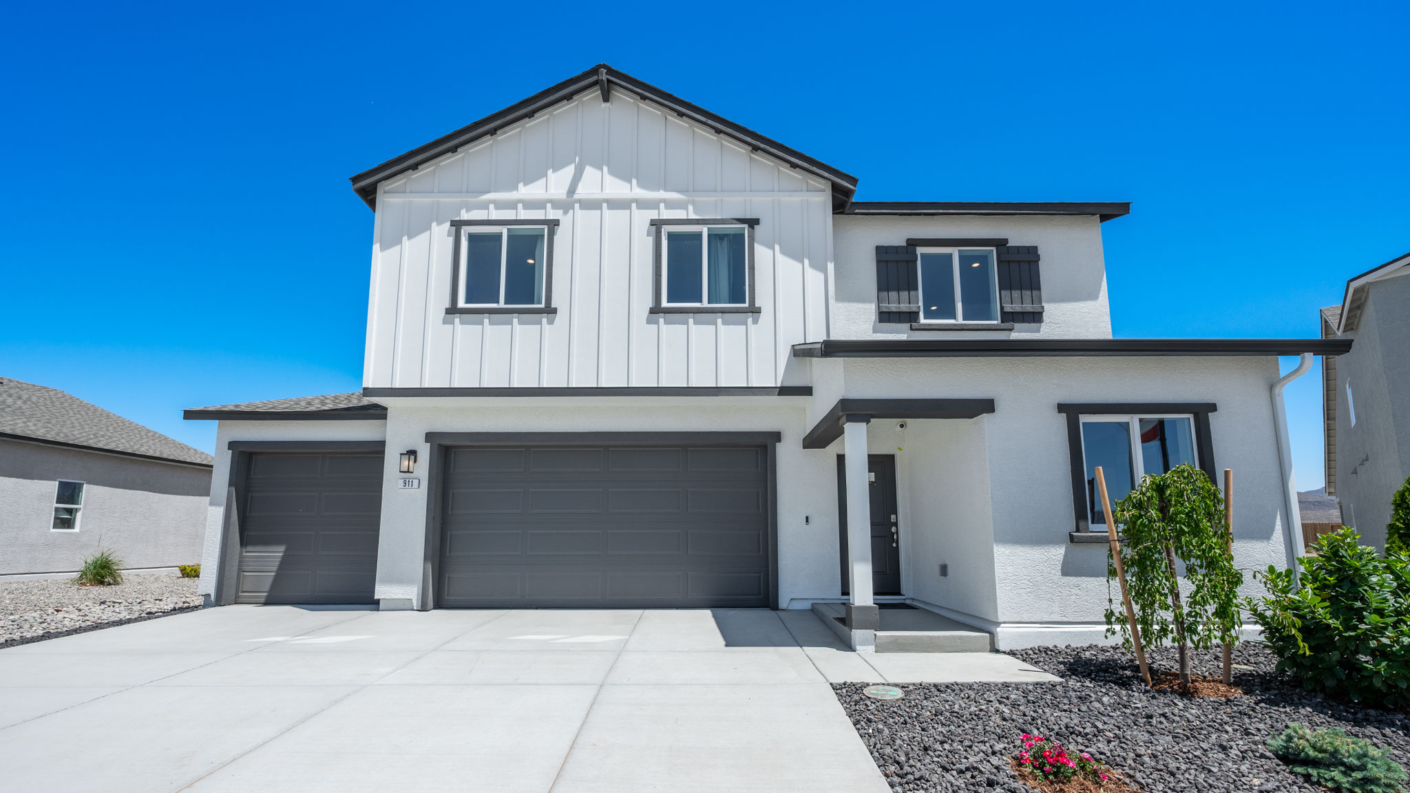 Two-story Yosemite floorplan with 3 car garage at the front of the home