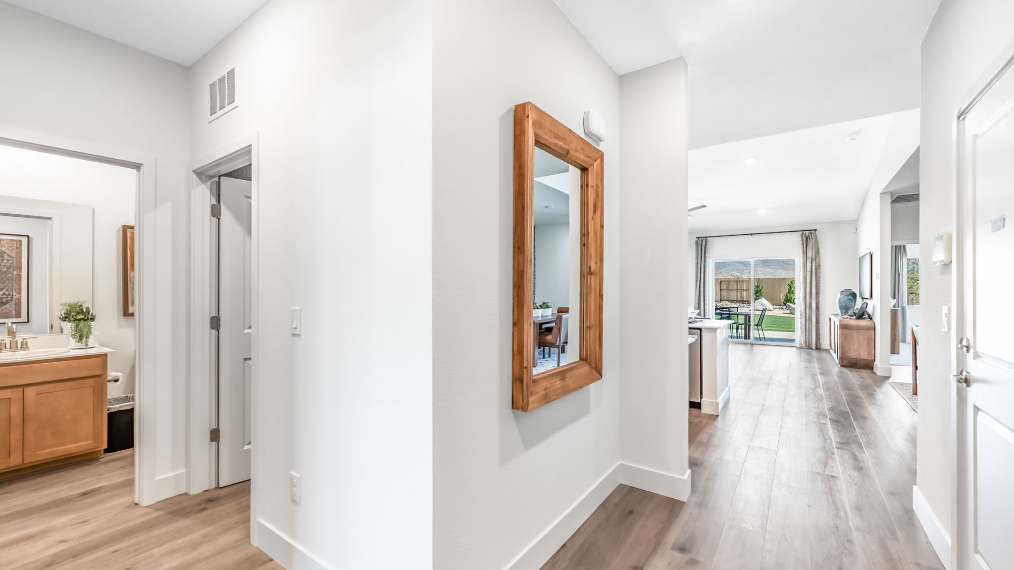 Entry to the Mammoth floorplan with a bedroom and bathroom at the front of the home