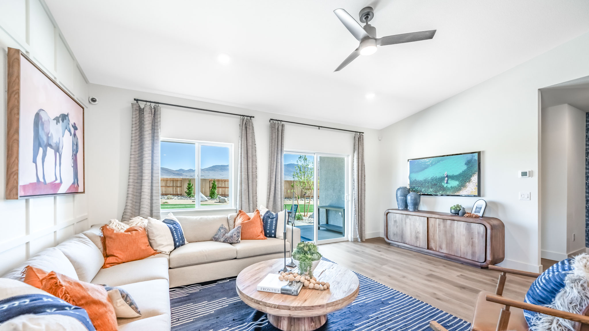 Open-concept first floor living room with bright natural light