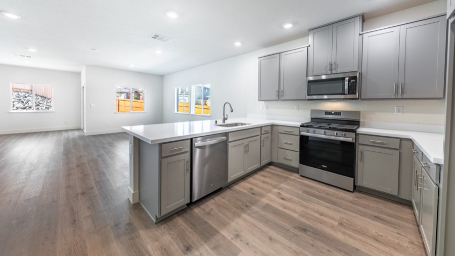 Open concept view from kitchen entry