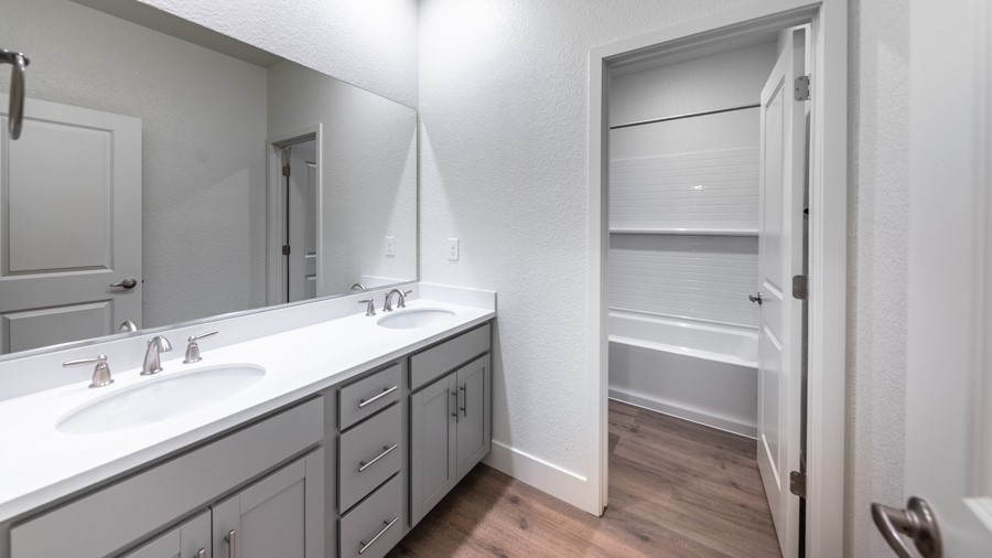 Secondary bathroom with dual sinks