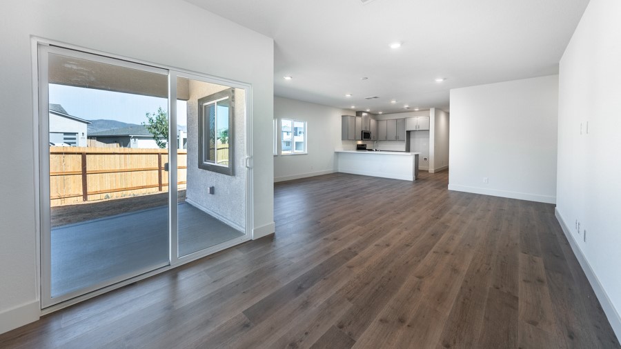 Dining area with large window next to primary bedroom
