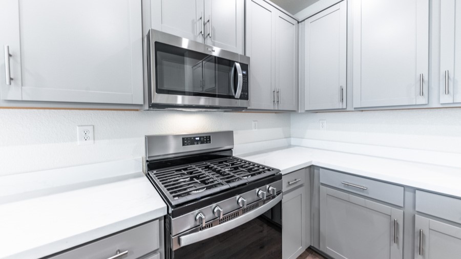 Kitchen with stainless steel appliances and island