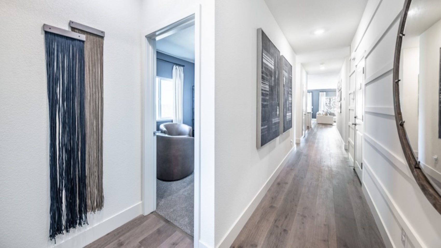 Entry to the Bryce floorplan with two bedrooms at the front of the home