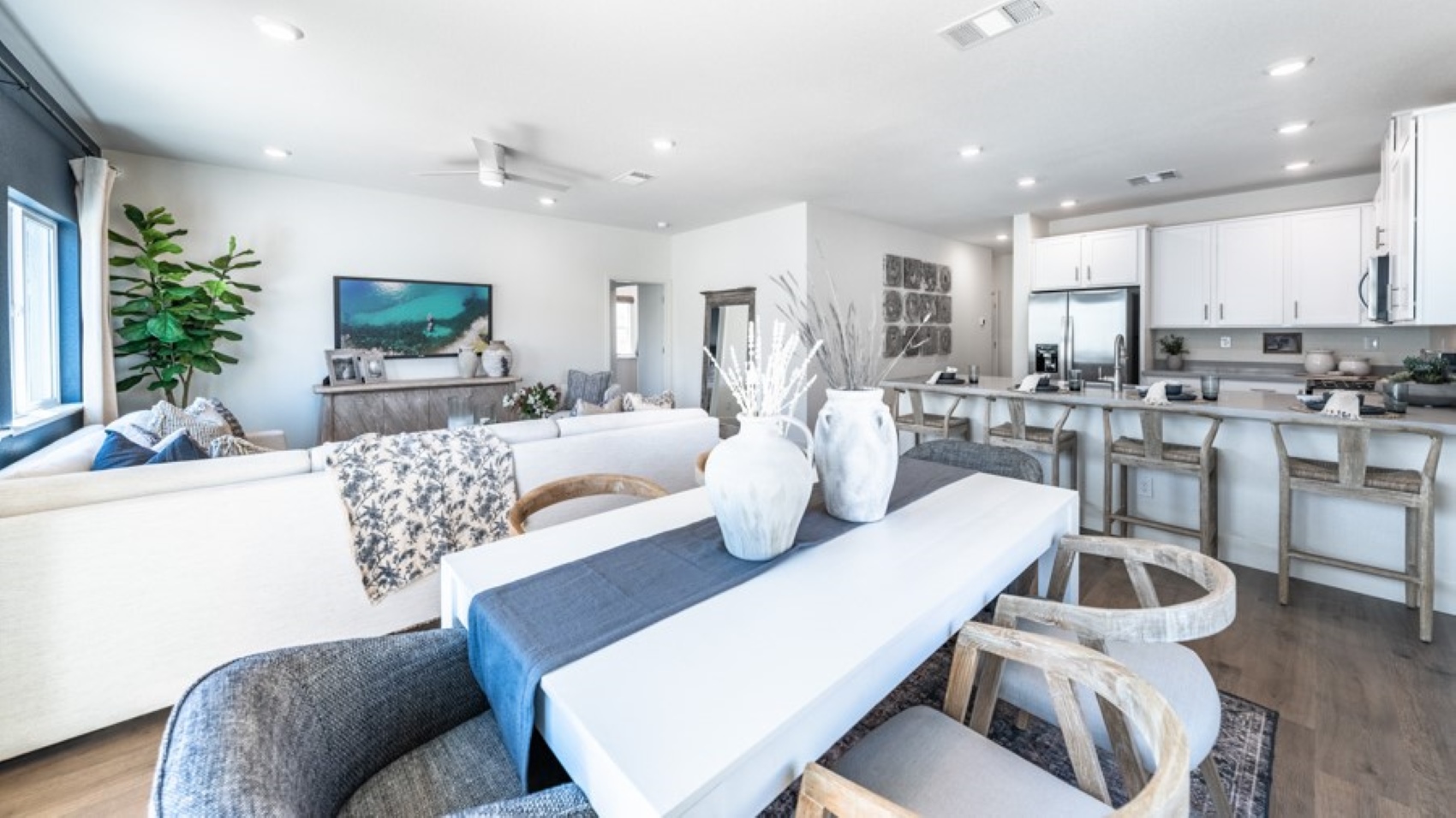 Dining area with access to back door looking into living room