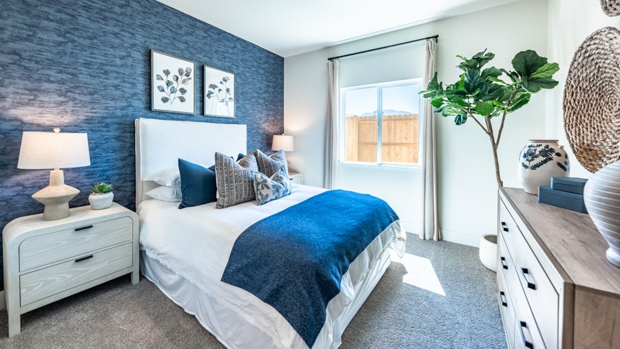 Secondary bedroom with carpeted floors