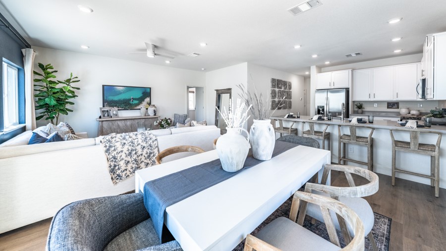 Dining area next to kitchen and living room