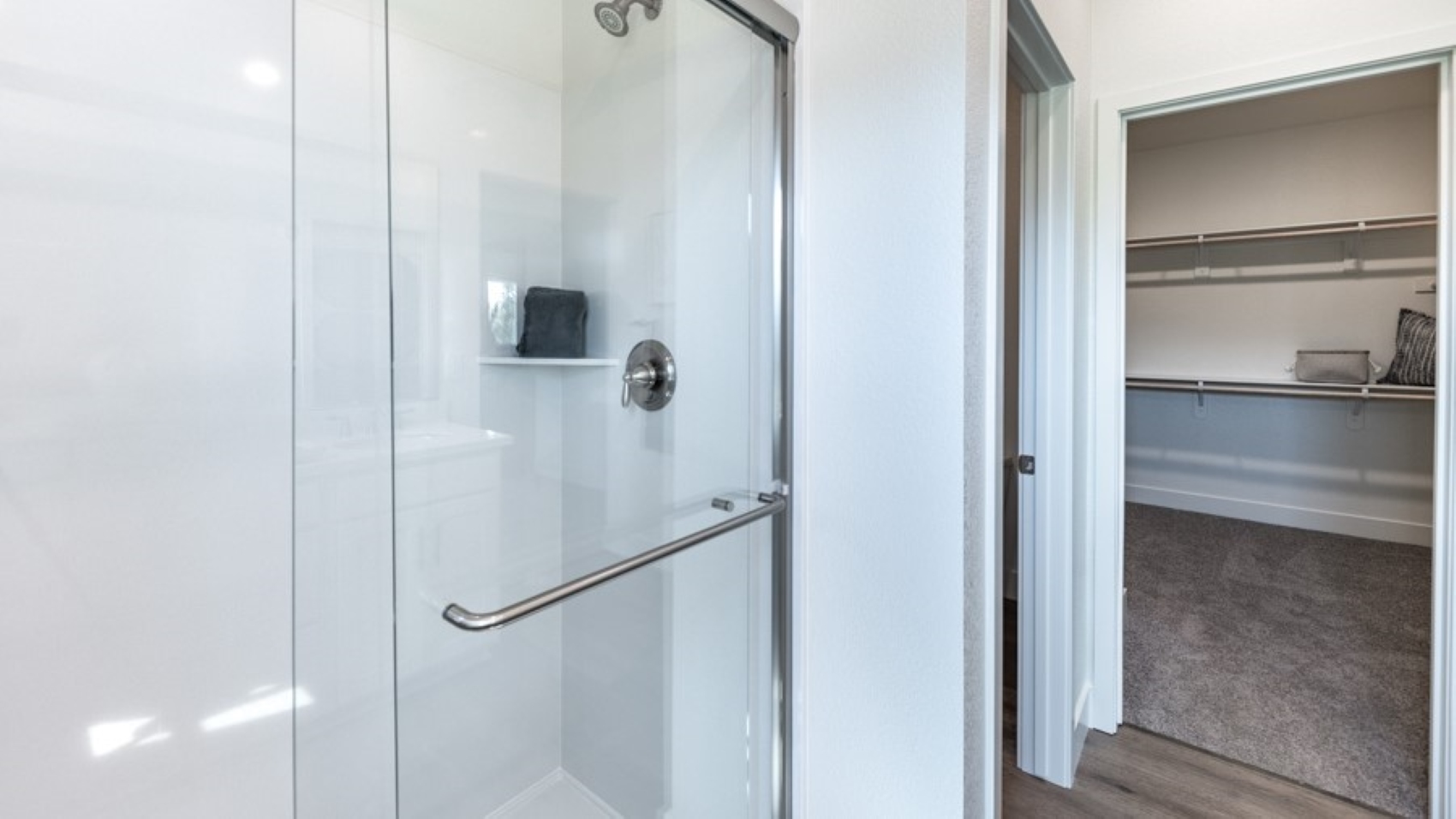 Walk-in shower next to walk-in closet