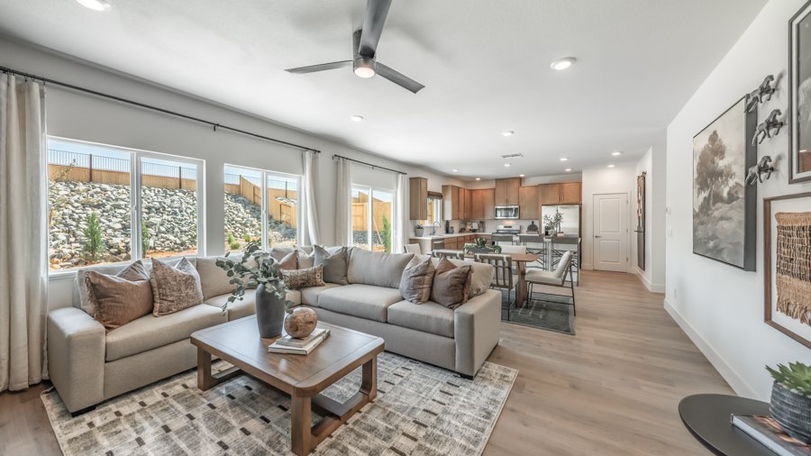 Open concept living area with kitchen, dining area and living room