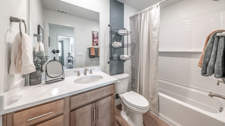 Secondary bathroom with a bathtub and shower combo