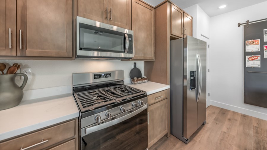 Stainless steel appliances in modern kitchen