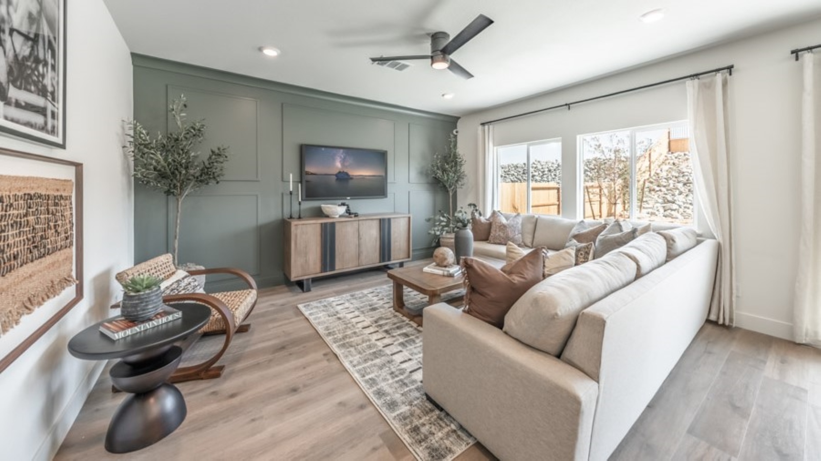 Open concept living area with kitchen, dining area and living room