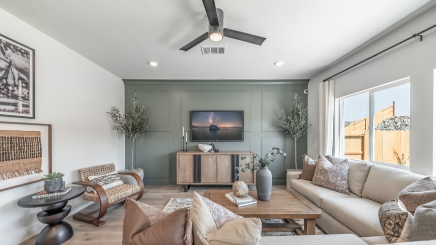 Large open concept first floor with large windows letting in plenty of natural light