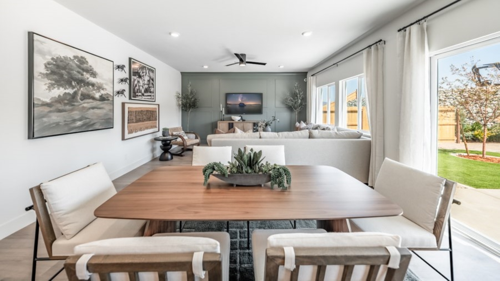 Dining area next to living room area