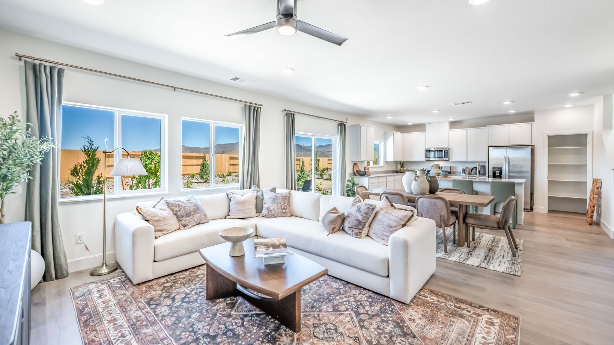 Open concept living room, dining area, and kitchen