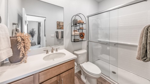 Secondary bathroom at the front of the home with walk-in shower