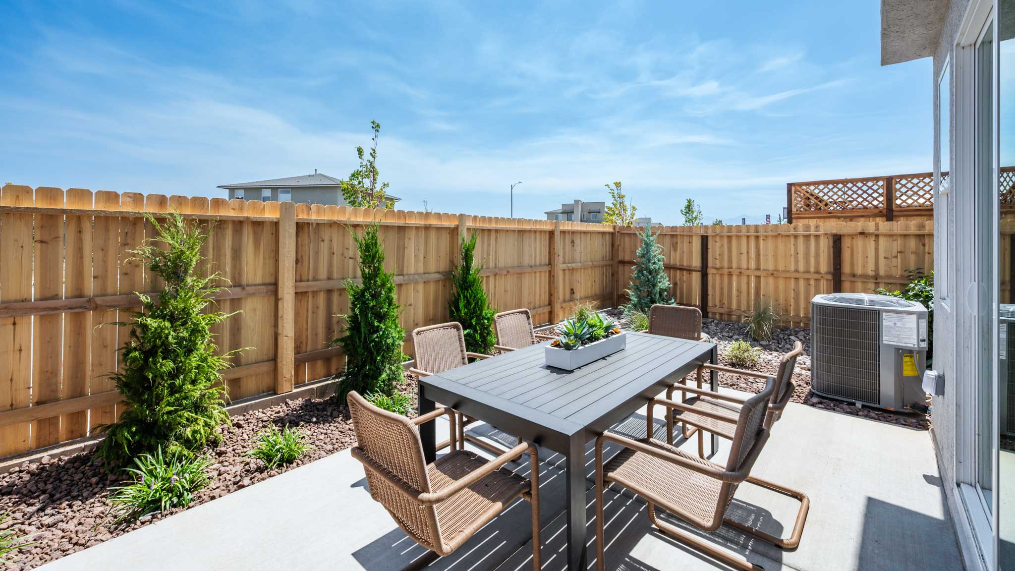 Backyard patio with outdoor dining table set