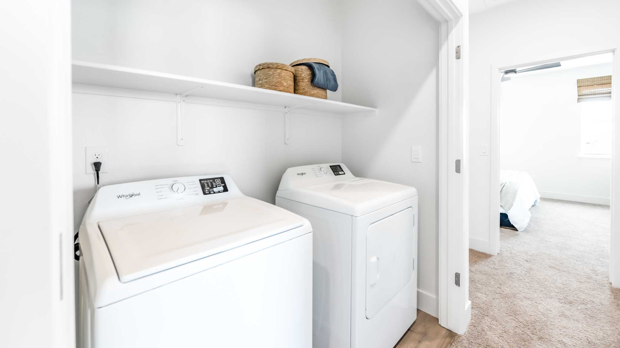 Laundry area with shelving