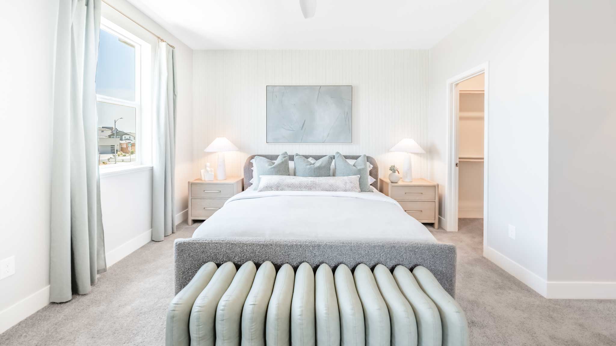 Primary bedroom with a large king sized bed