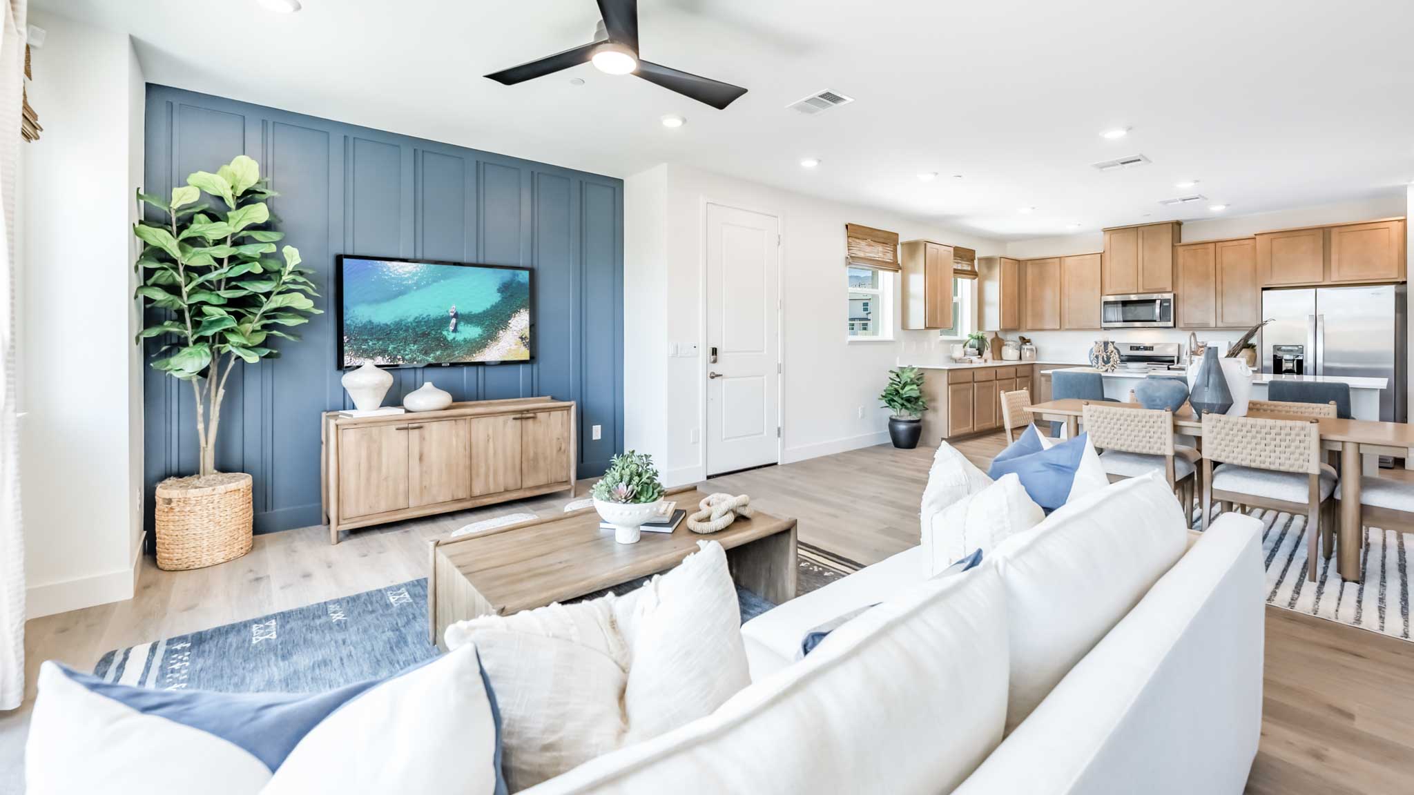 Open concept great room looking towards the kitchen and dining area