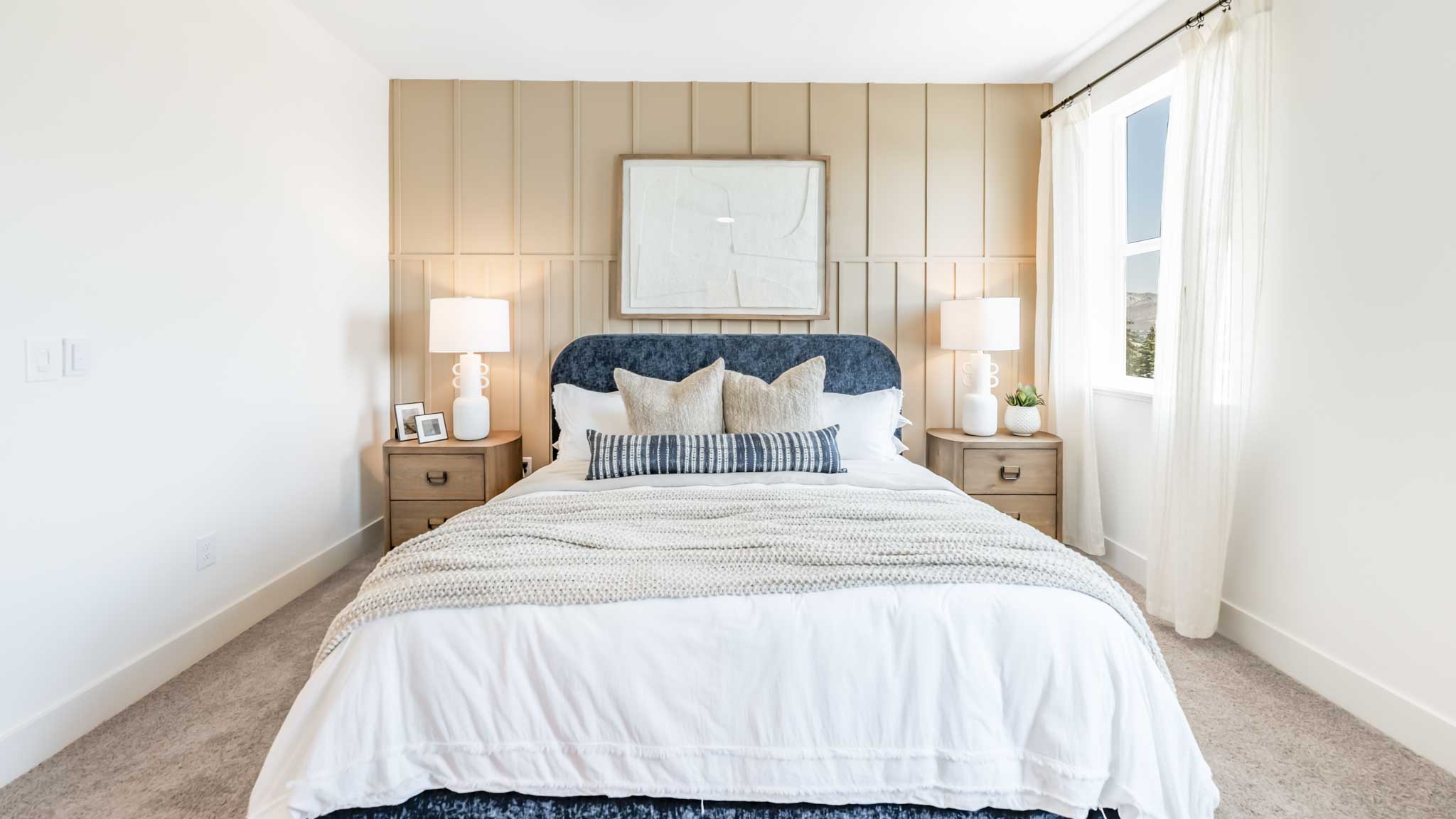 Primary bedroom with a large king sized bed