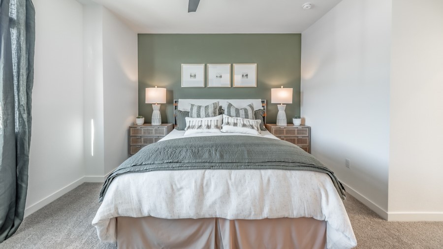 Primary bedroom with a large king bed