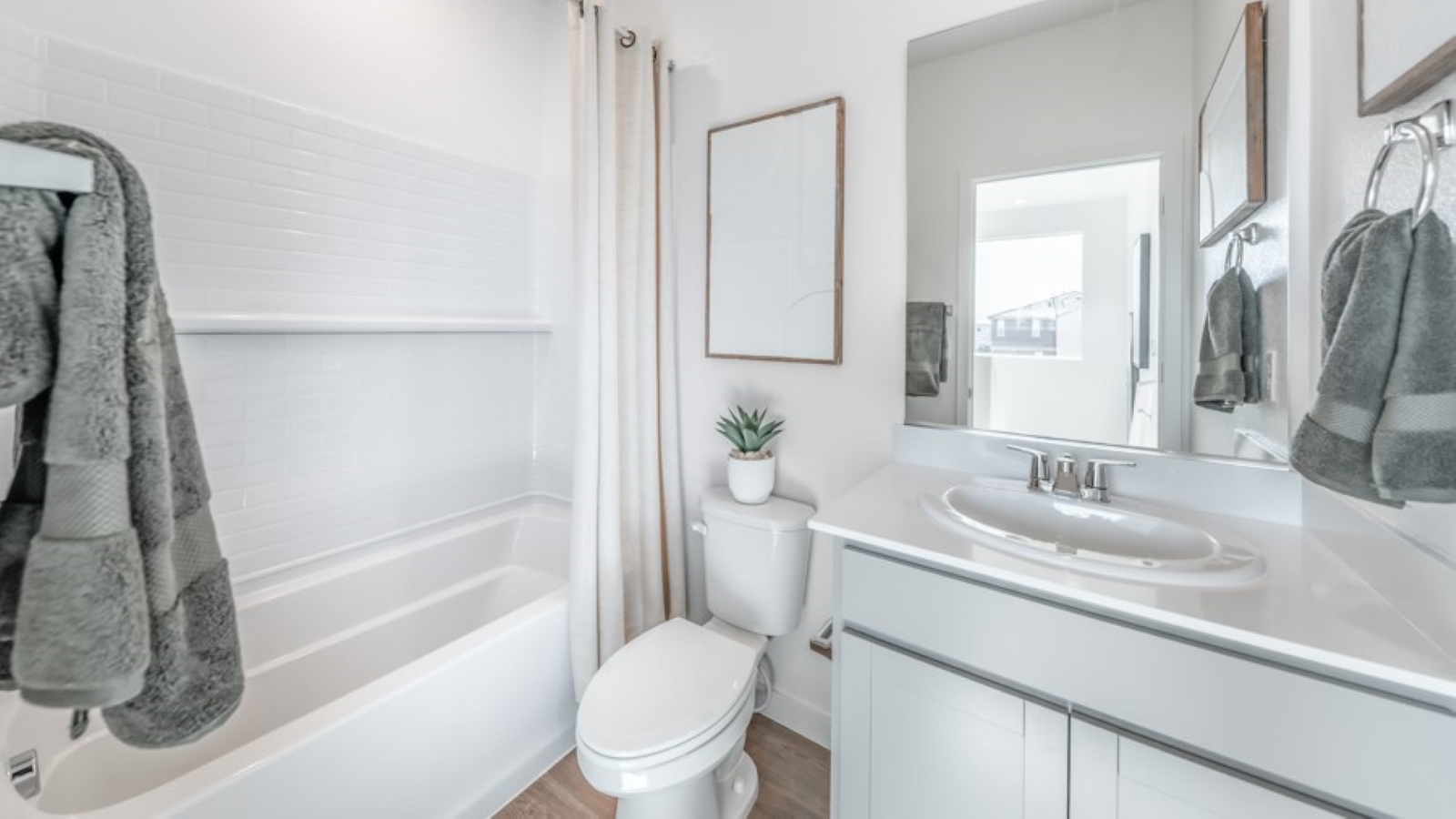 Secondary bathroom with bathtub and shower combo