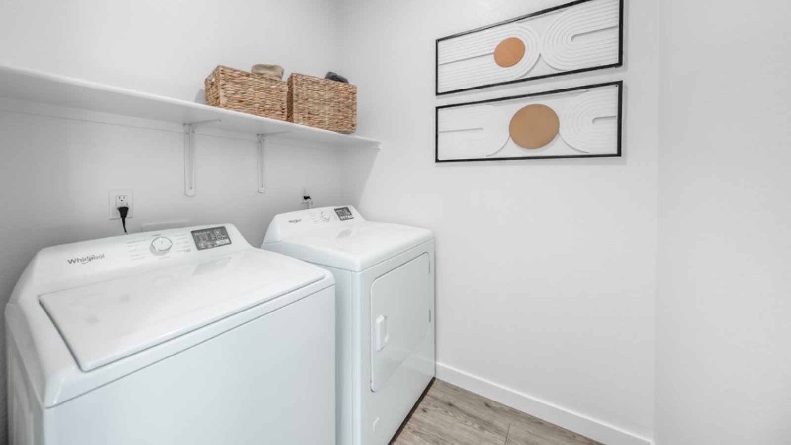 Laundry room with full-sized washer and dryer