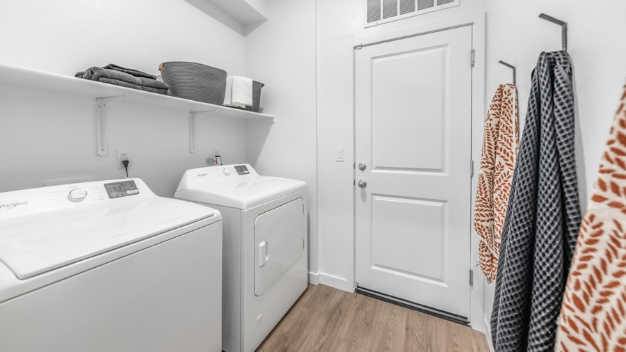 Laundry room with full-sized washer and dryer