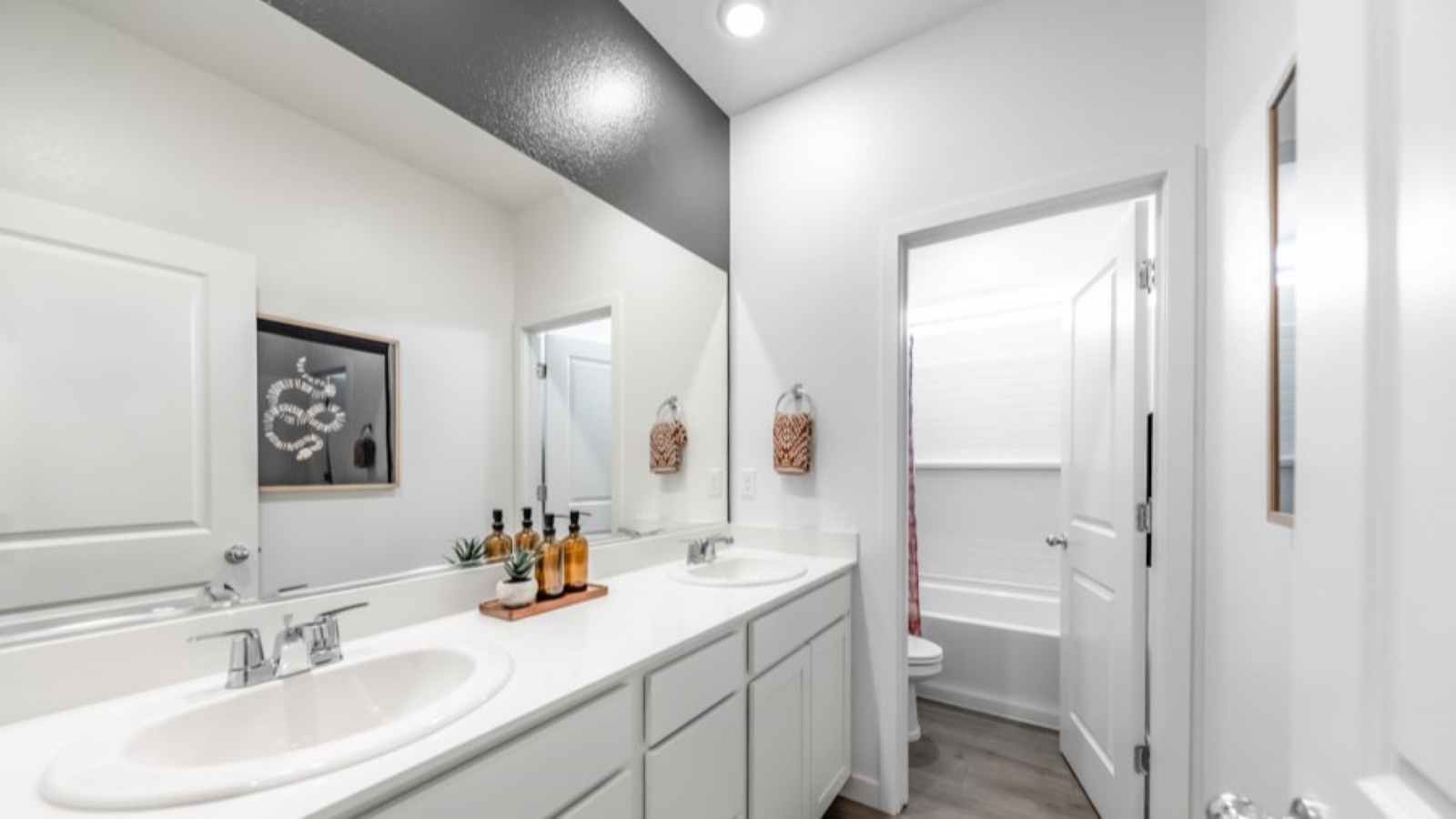 Secondary bathroom with bathtub and shower combo