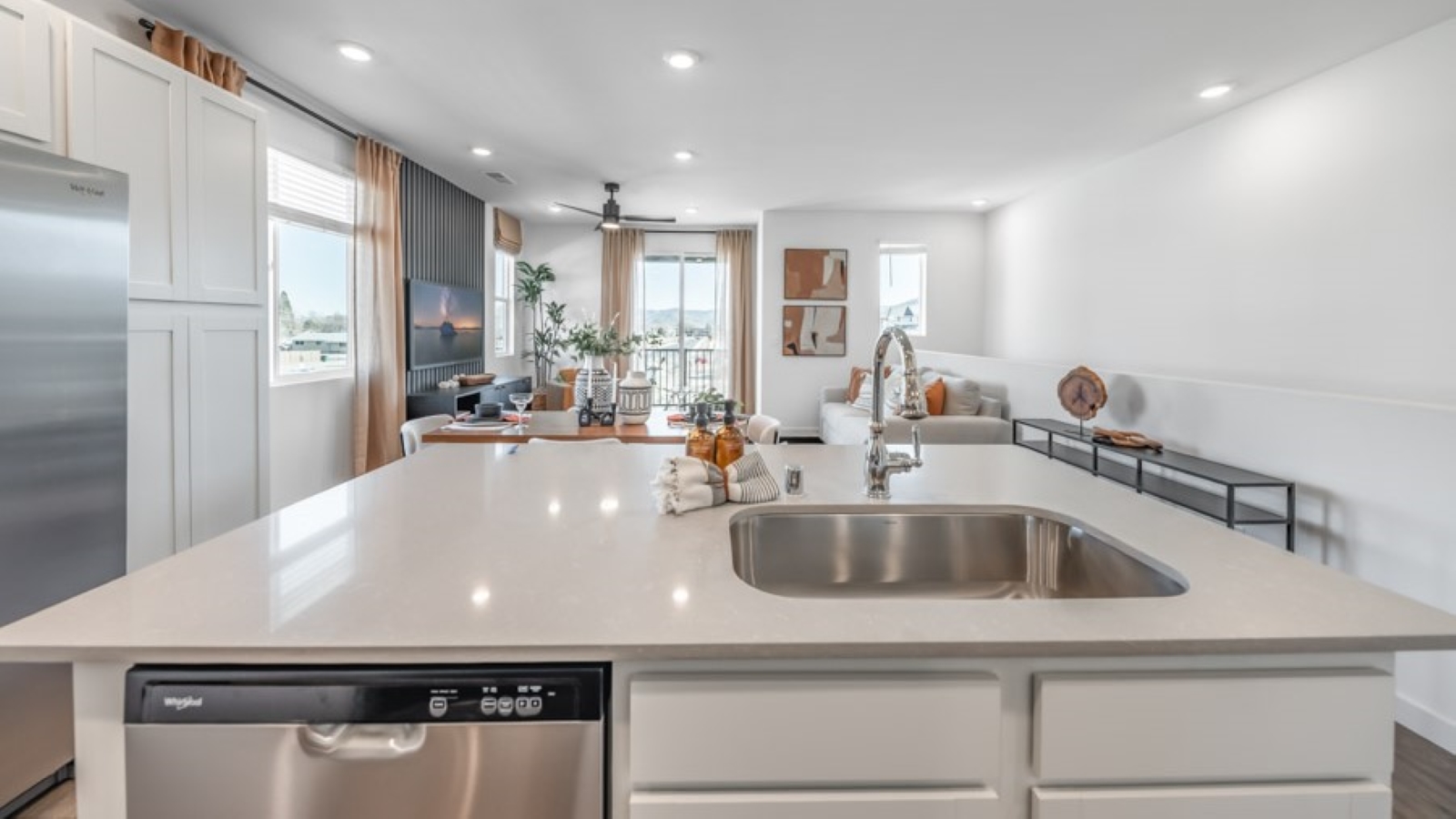 Modern kitchen looking out towards the great room
