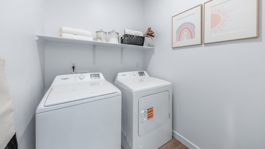 Laundry room with full-sized washer and dryer