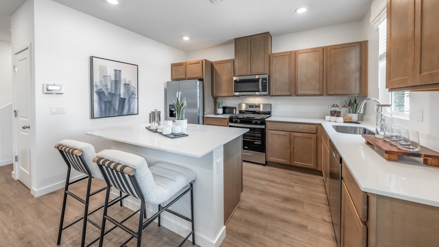 Kitchen and dining space next to the entry