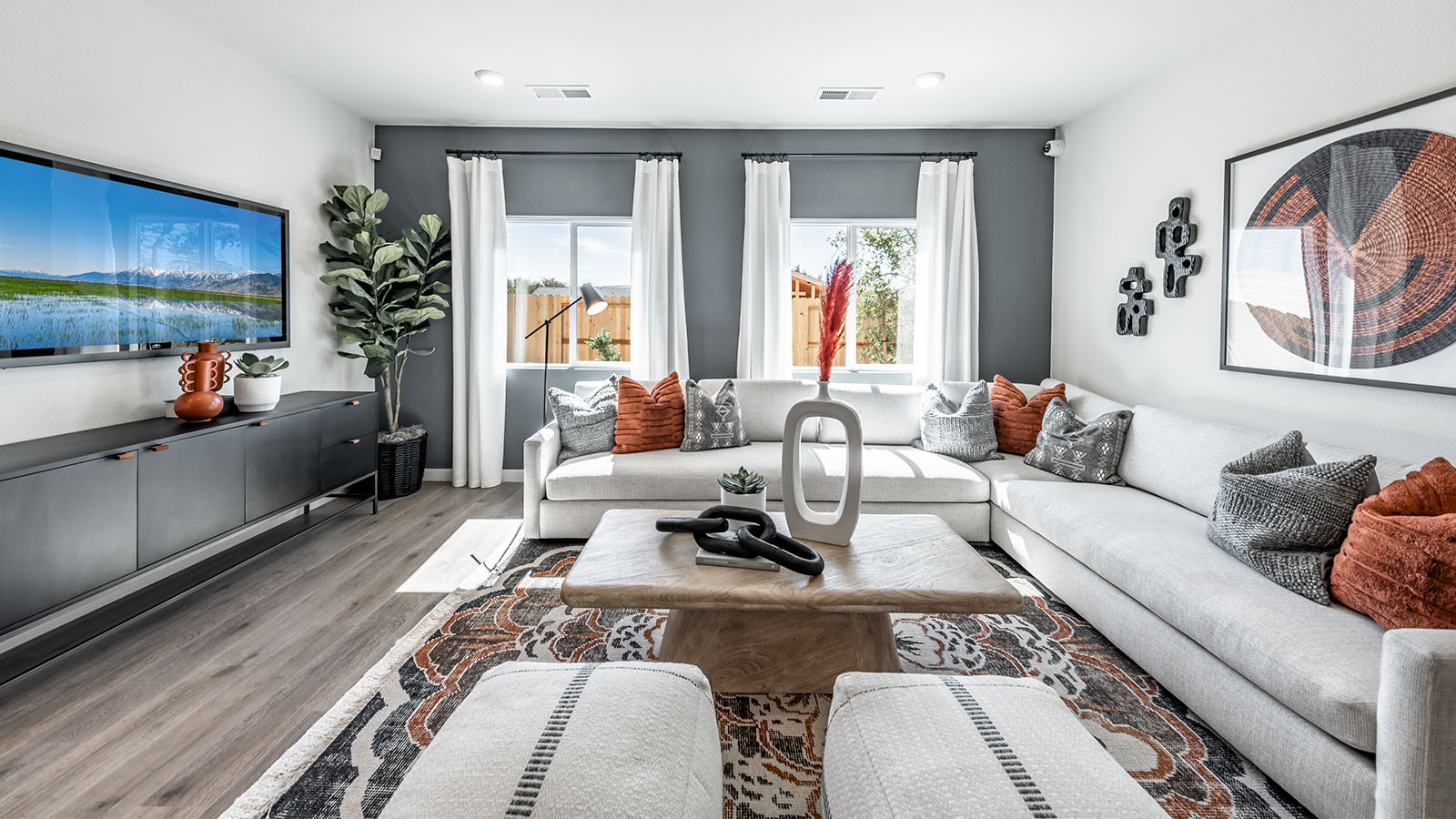 Modern living room space next to primary bedroom