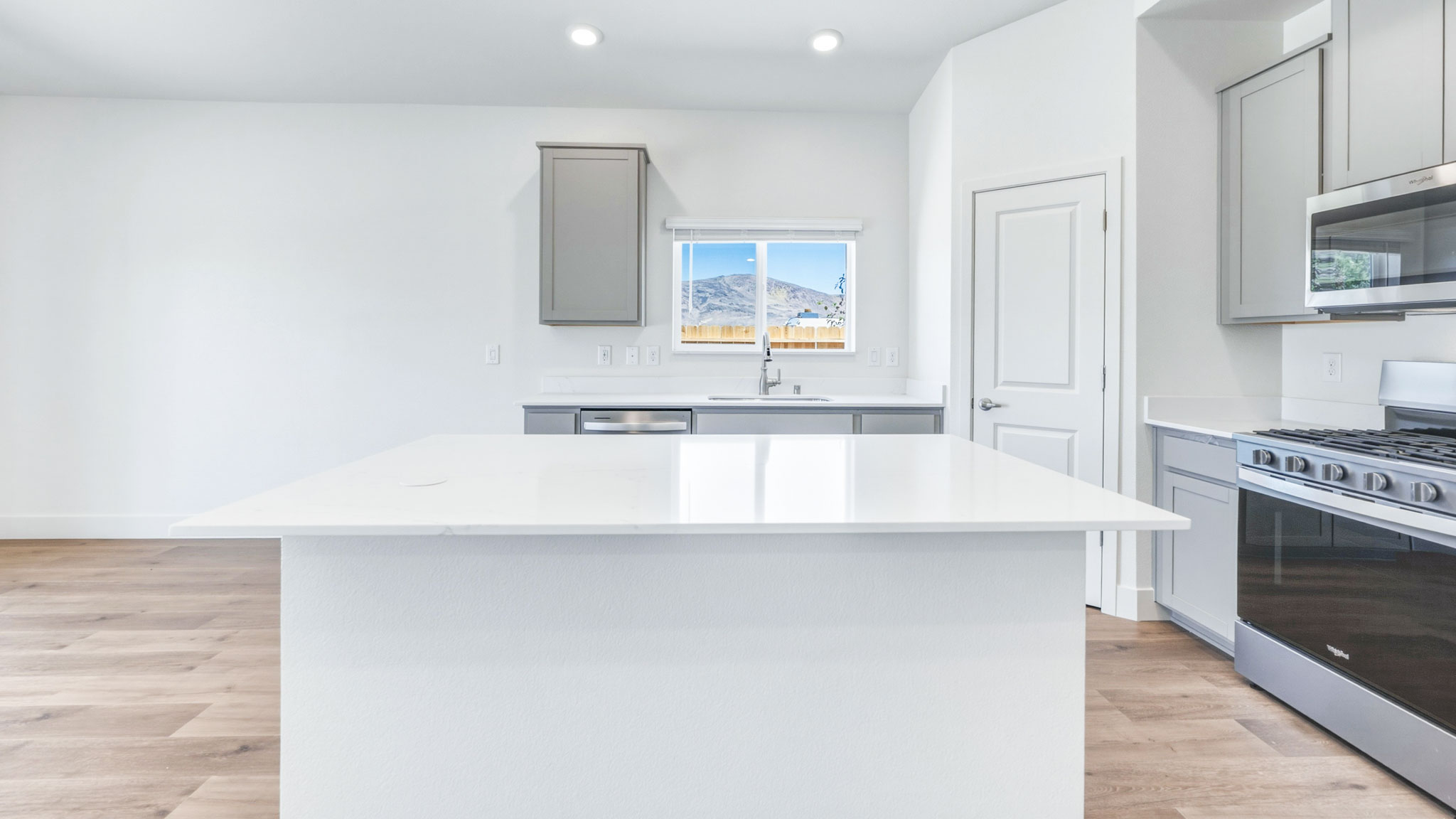 Large island looking towards the sink and the window