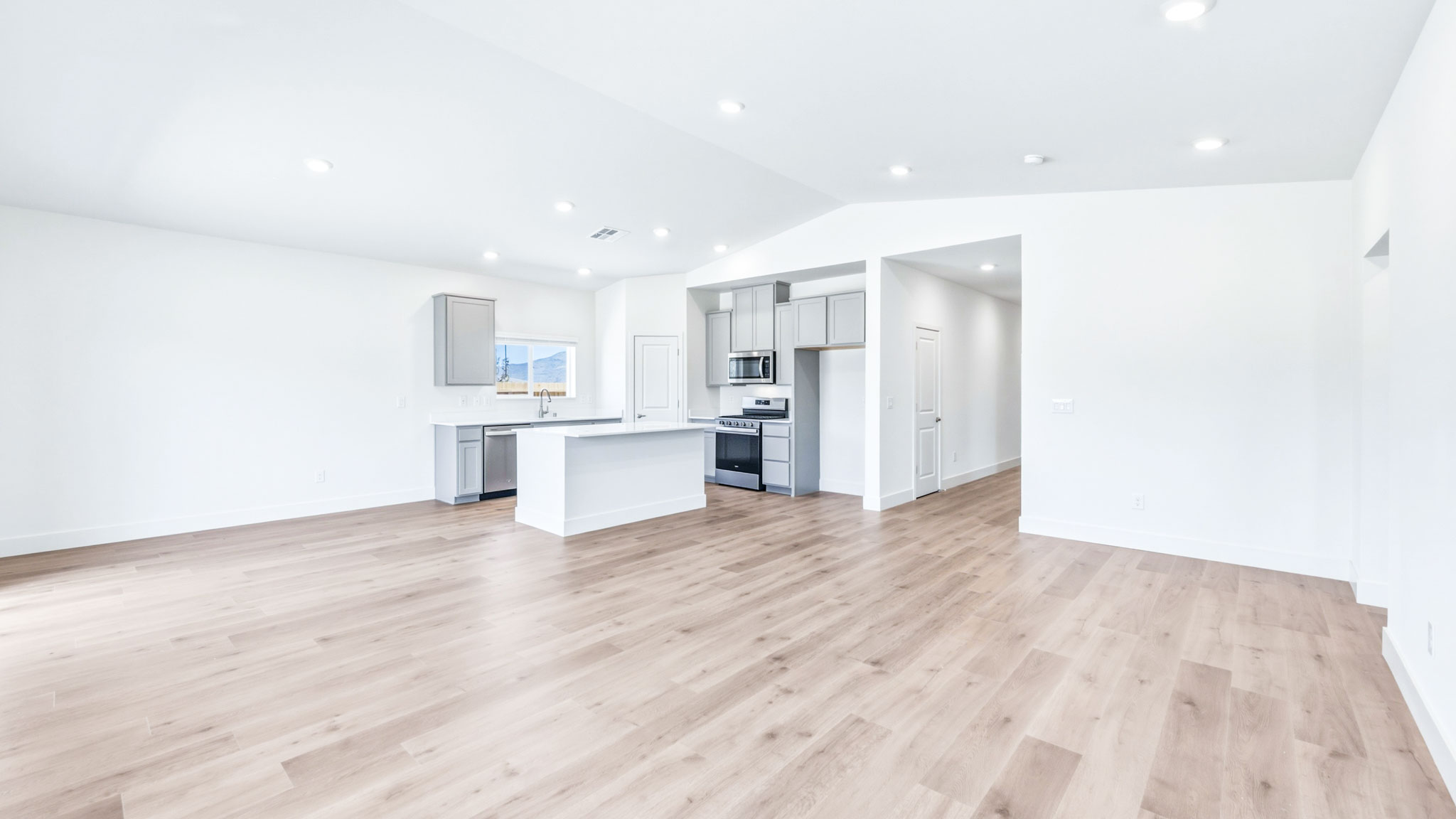 Great room looking towards the modern kitchen