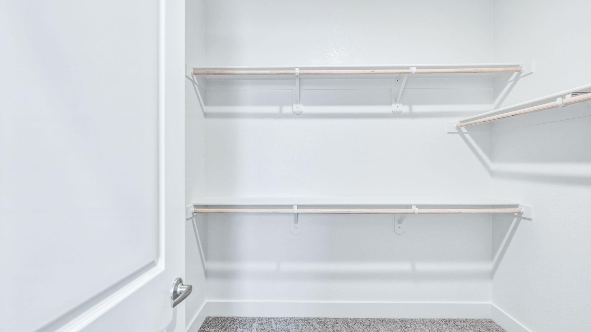 Large primary closet with shelving