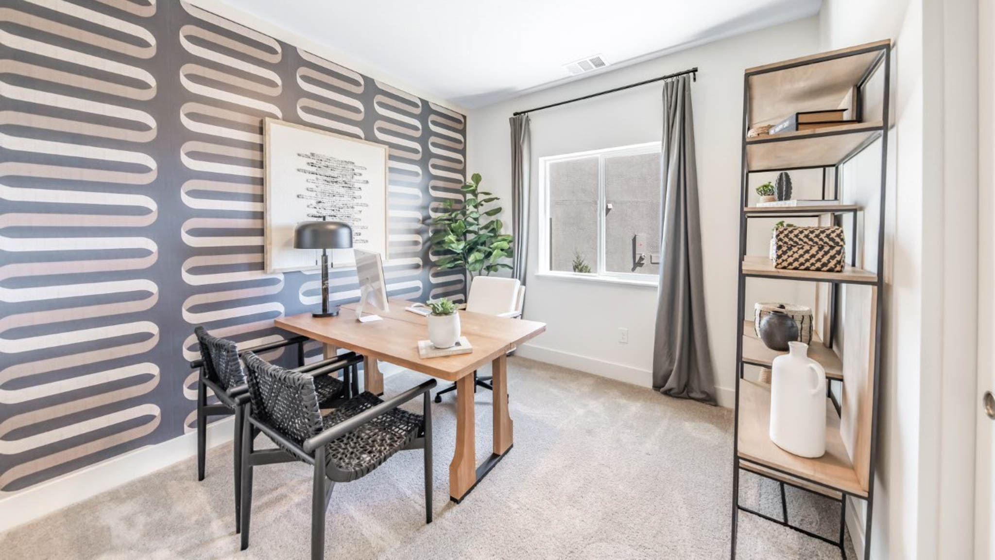 Secondary bedroom decorated as an office