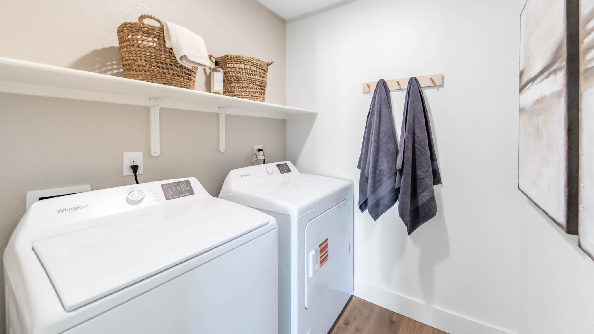 Laundry room with shelving