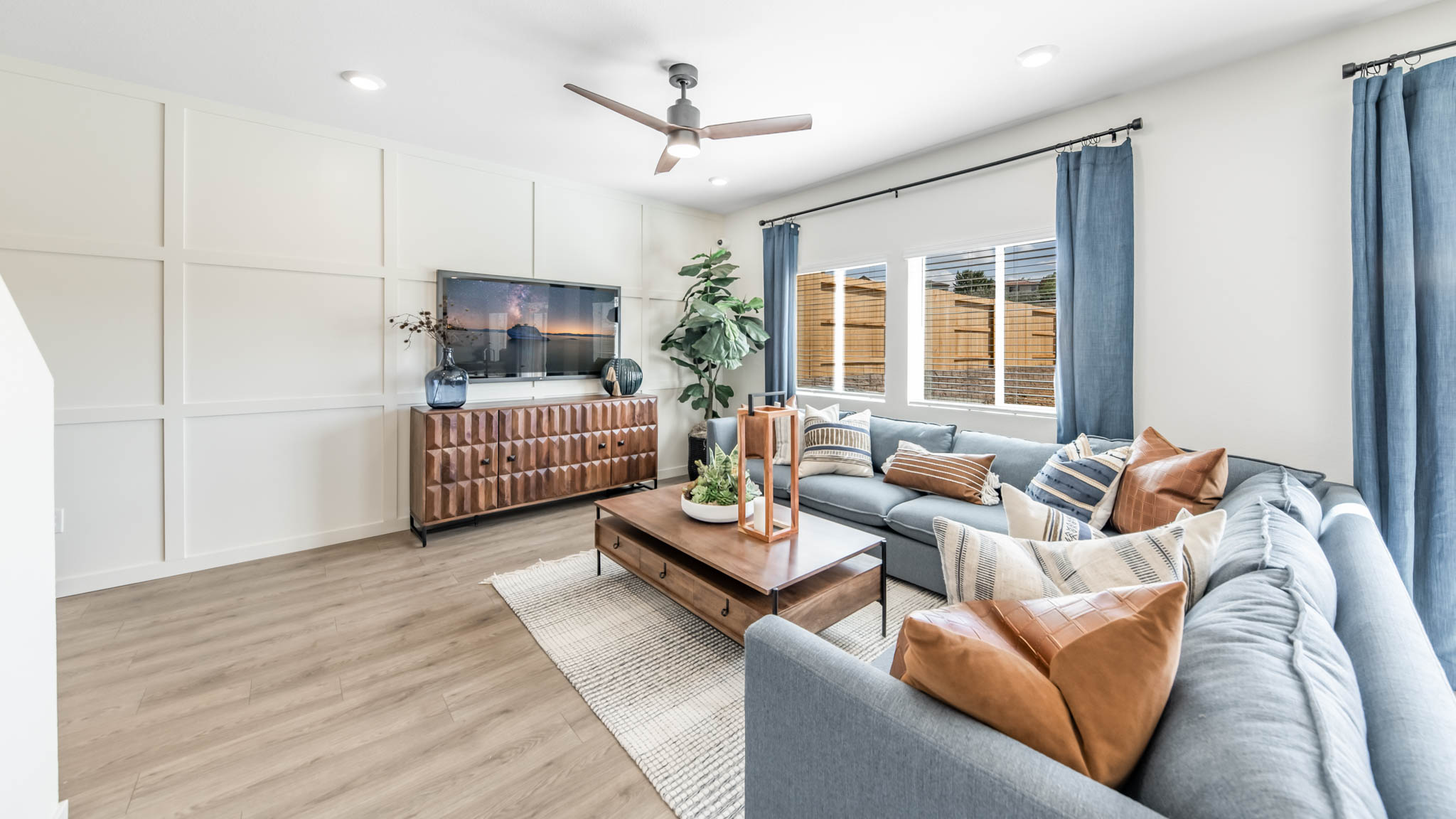 Bright great room with large windows