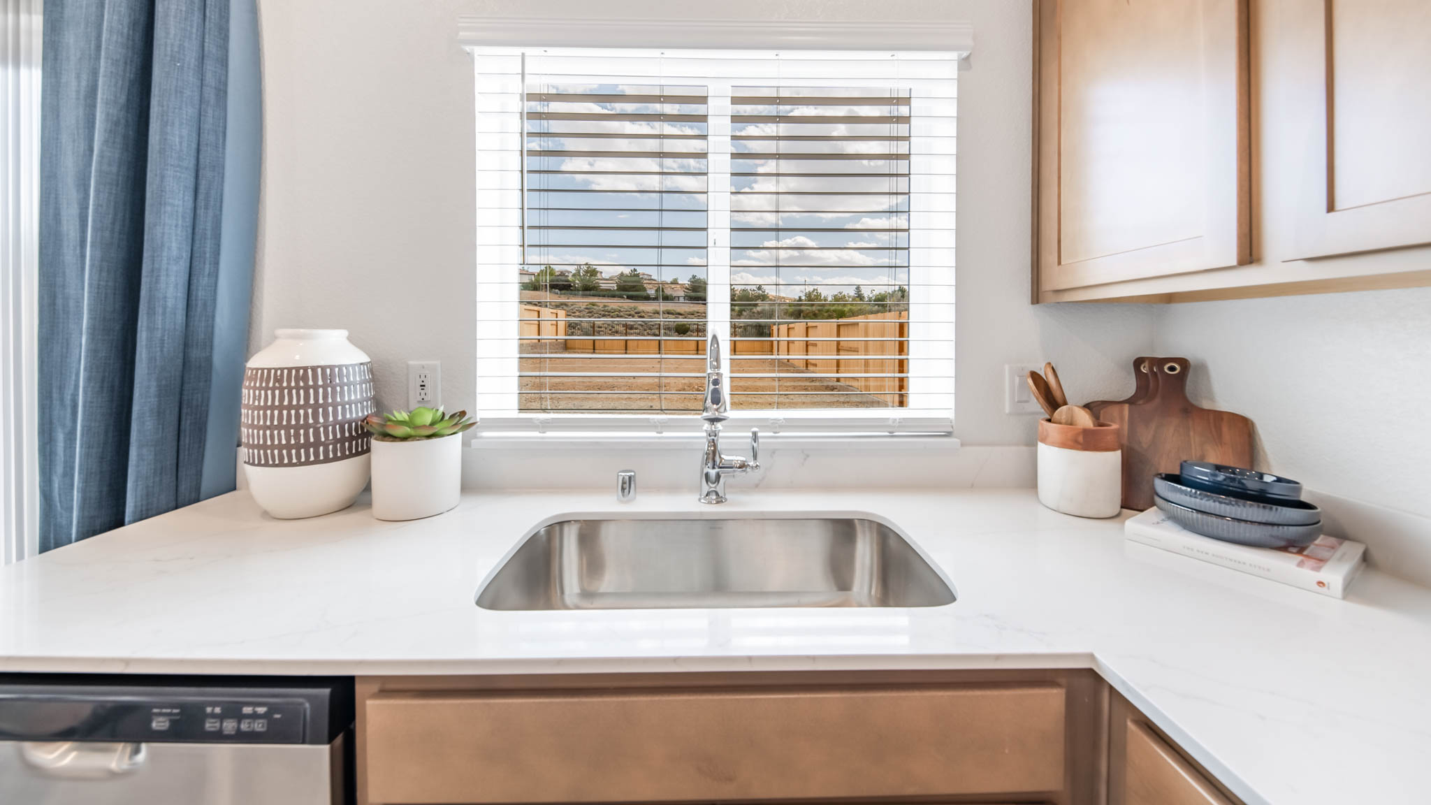 Single basin sink with a large window above it