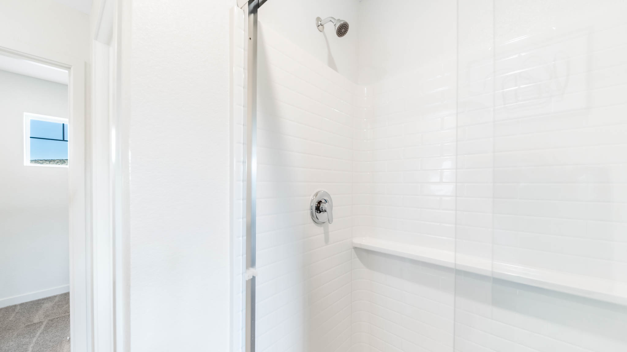 Spacious walk in shower in the primary bathroom