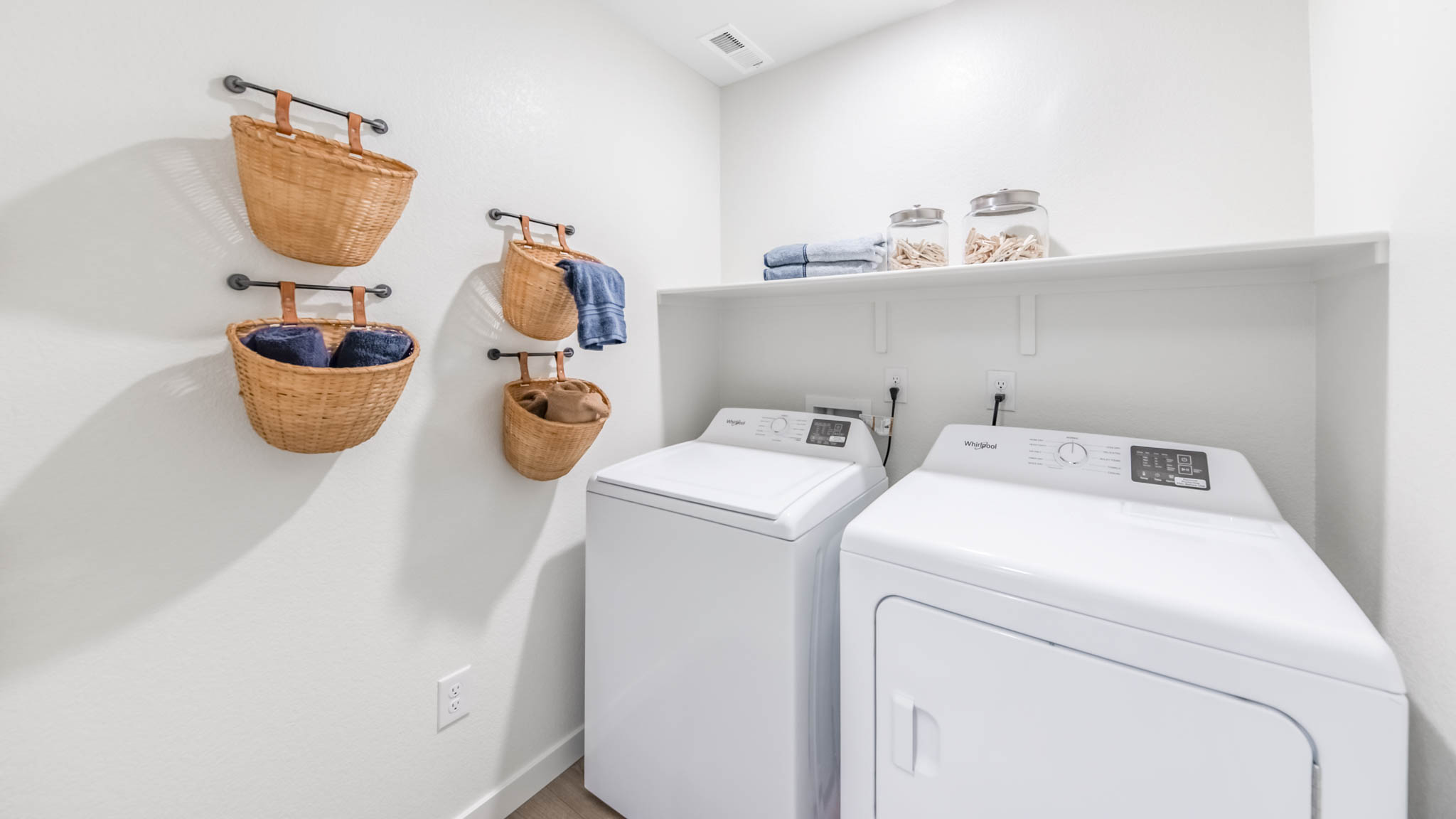 Laundry room with shelving