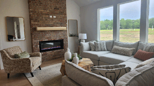 Living area with fireplace and mantle