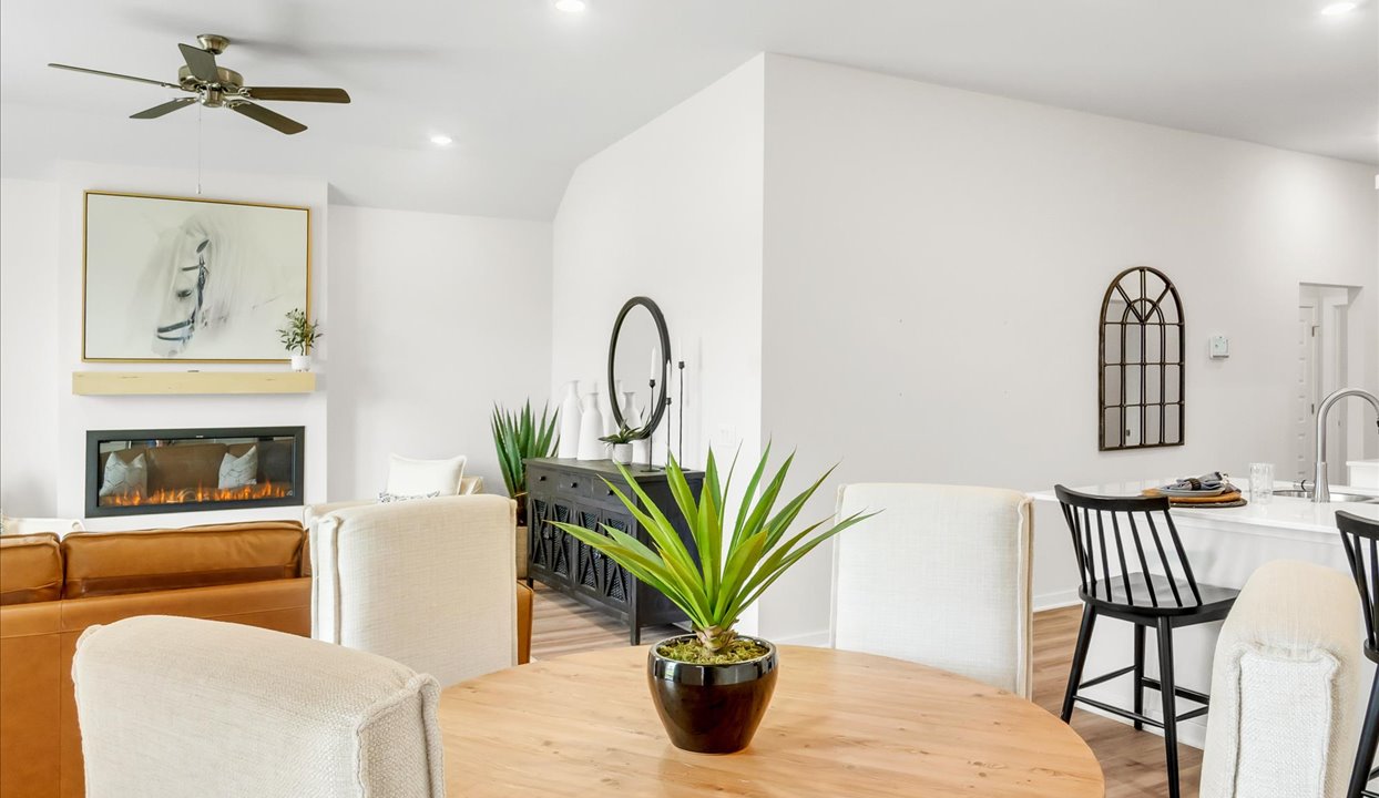Open concept living space featuring a spacious living room area next to kitchen.
